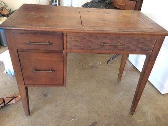 Sewing table with sewing machine inside