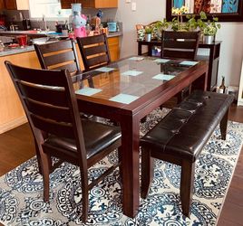 Dining table with 4 chairs and a bench