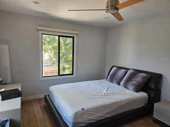 Dark Leather Queen Platform Bed