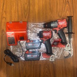 (1) Milwaukee M18  Fuel Hammer Drill/Driver(2904-20)  (1)M18 Fuel Impact Driver(2953-20)  (2) M18 5.0 Ah XC Battery  (1) M12/M18 Charger