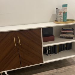 Shelving Unit With Gold Legs. 