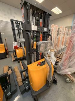 Used Semi-electric straddle stacker A-3007