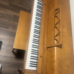 Antique Yamaha Piano with bench