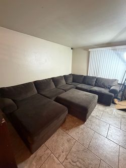 Sectional couch with ottoman