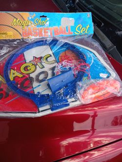 Brand new basketball and hoop