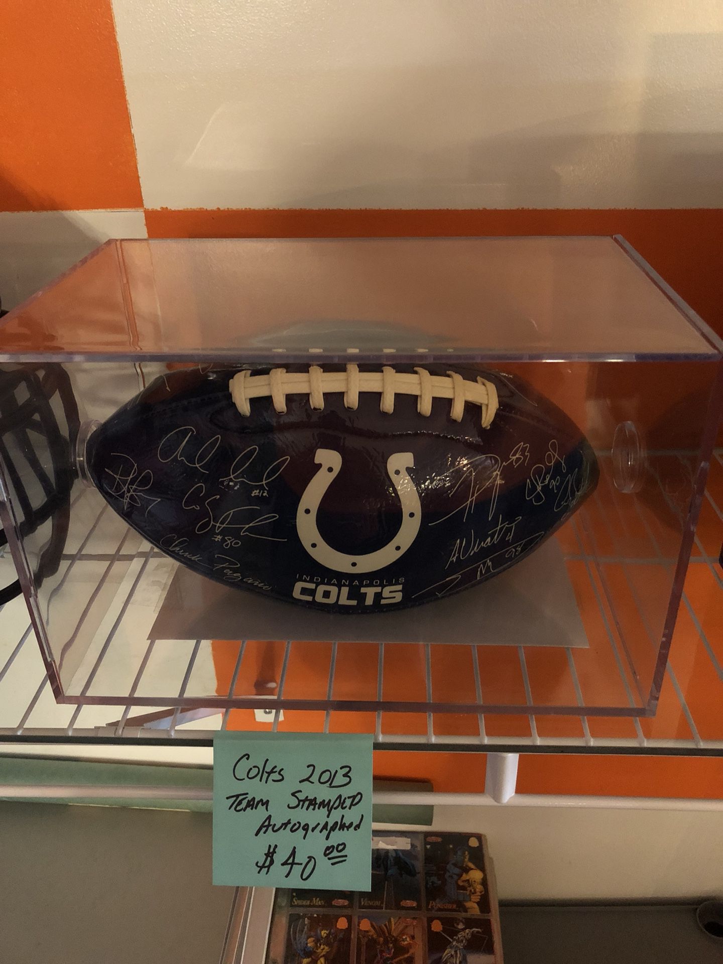 Colts 2013 team stamped “autos” football