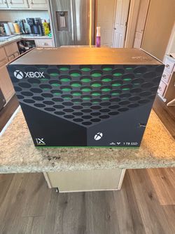 X box series X w three games and two controllers