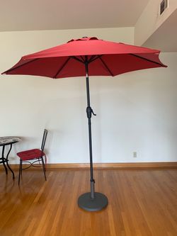 Brand new patio umbrella plus base both for $55