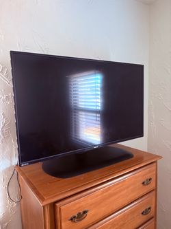 42” Toshiba TV - does not come with stand