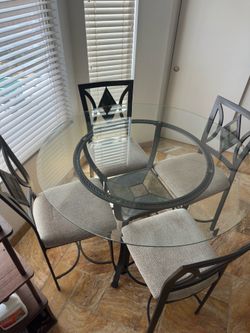 Round Glass Top Dining Table with 4 Slate Accent Chairs