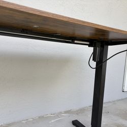 Electric adjustable height desk.