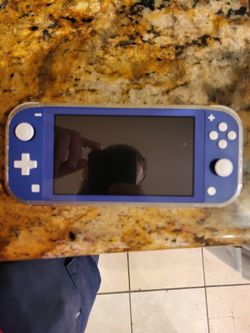 Nintendo Switch Lite W/games
