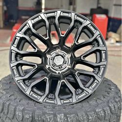 Fuel FC899 chisel 20x10 6x139.7 -18 black with 33x12.50r20 mud tires available in stock we finance