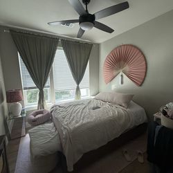 Walnut wood platform bed frame from Wayfair.