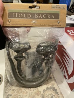Curtain hold backs