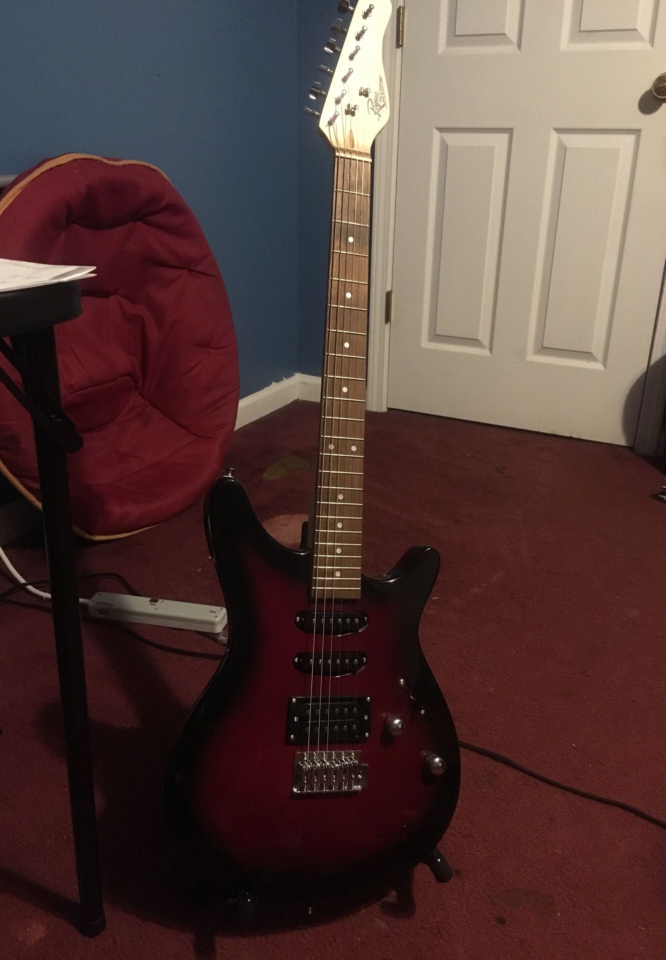 Electric Guitar (Rouge Rocketeer) *Comes With Gig Bag*
