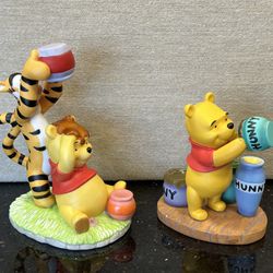 Winnie the Pooh and tigger figurines
