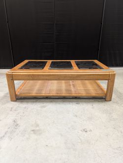 Vintage Style Burled Wood Coffee Table with Glass Top and Cane Accents