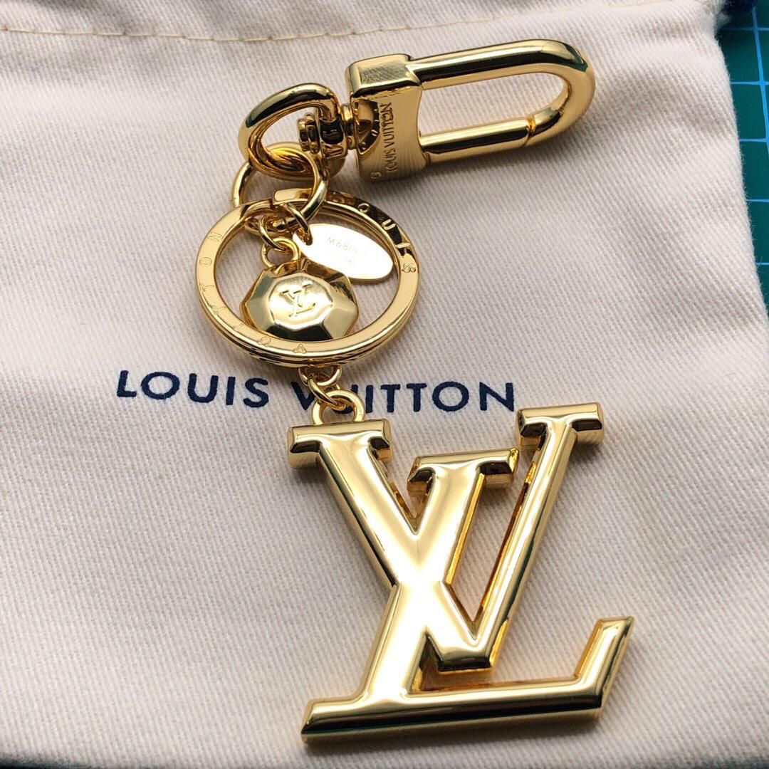 Louis Vuitton LV New Wave Bag Charm and Key Holder Gold Metal