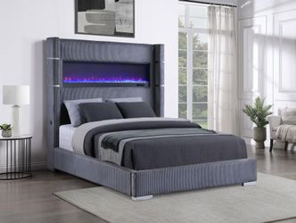 Gray Upholstered Bed with Built-In Electric Fireplace