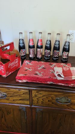 6 pack Okocha cola bottles Table clause And rag