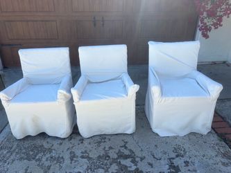 3 slip covered chairs