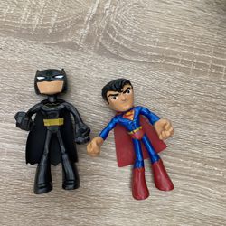 Tiny superheroes Batman and supermen
