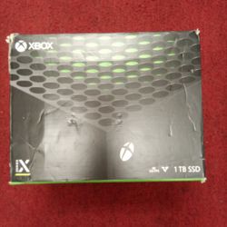 Xbox Series X with controller in box