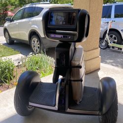 Brand new Loomo by Segway Robotics self balancing scooter 30miles range (retail $2300)