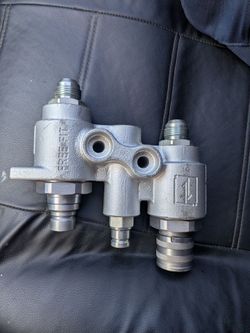 Case implement quick connect valve