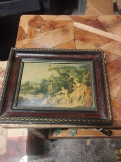 Antique  "The Nest" (or "The Shepherd's Gift") by French artist François Boucher, set in a dark wood frame.