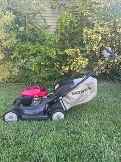 FEW TIMES USED ALMOST NEW SELF PROPELLED LAWNMOWER HONDA HRX-217 /200cc TWIN BLADE / BLADE CONTROL SYSTEM . XENOY DECK NEVER GER RUST, DENT or CORRODE