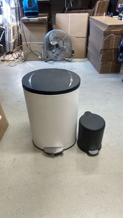 Trash cans with soft close lids