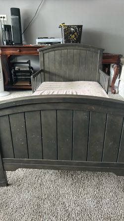 slightly used Toddlers bed with mattress