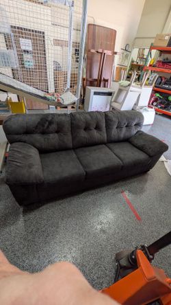 Beautiful, clean, dark gray sofa. Very good condition only $50. Must pick up today, Sunday 6/21