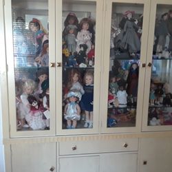 Dolls, Doll Clothes, Accessories And Cabinet