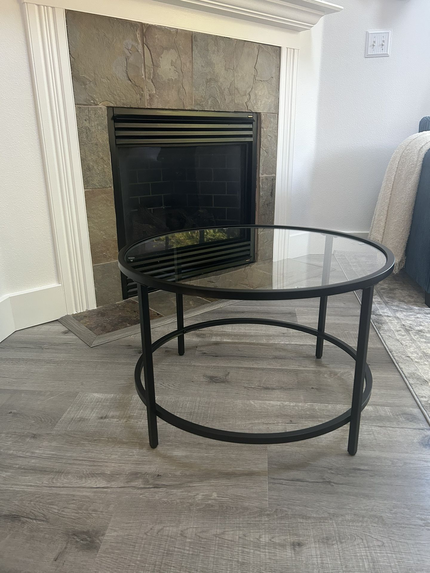 Round glass coffee table