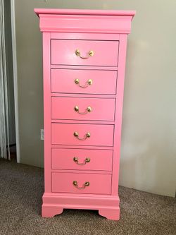 Light pink tall dresser with gold painted handles