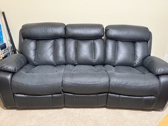 Black faux Leather Reclining sofa and love seat