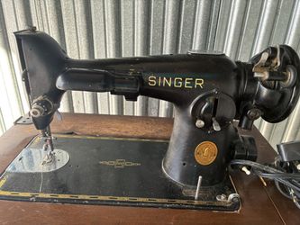 Old school SINGER sewing machine.