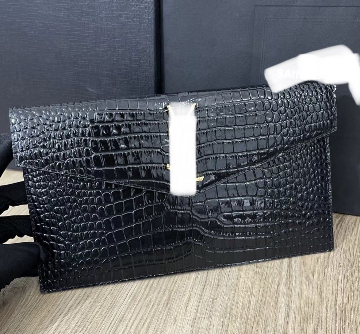 Saint L Pouch Read Below