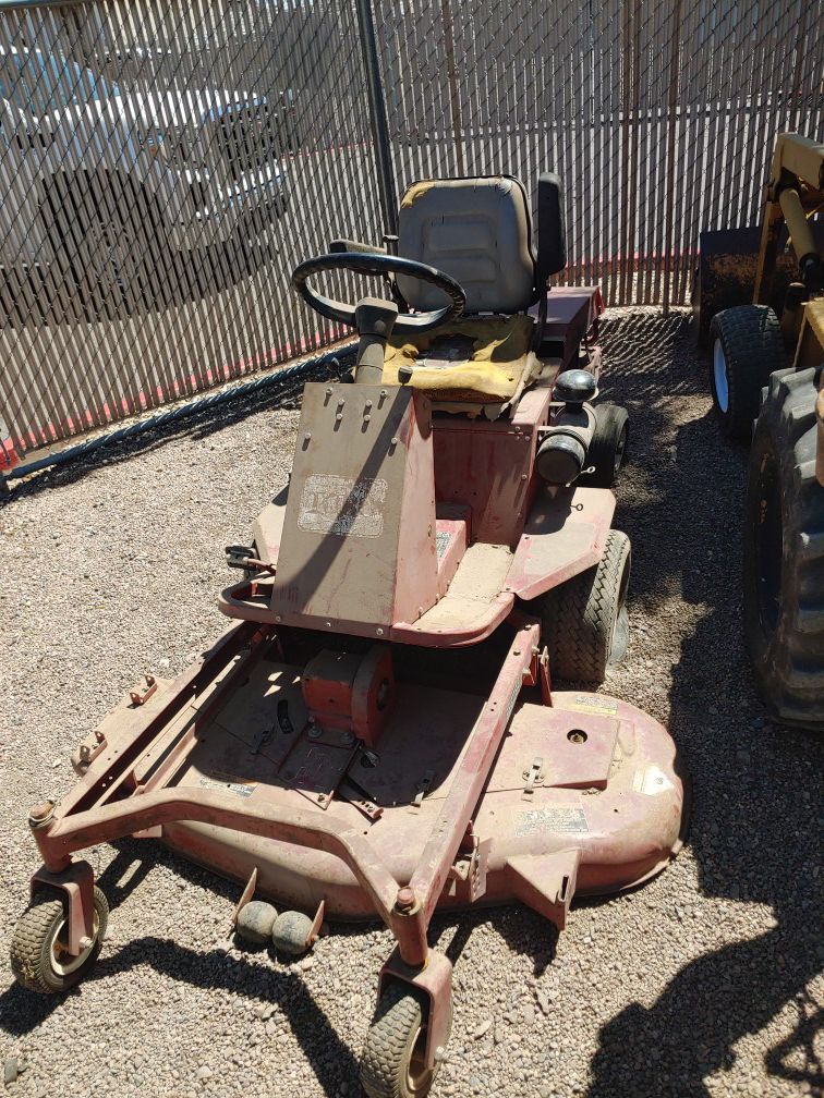 Tractor style lawn mower