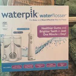 Brand New  Waterpik Brand Water Flosser