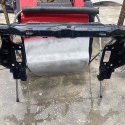 Genesis radiator support