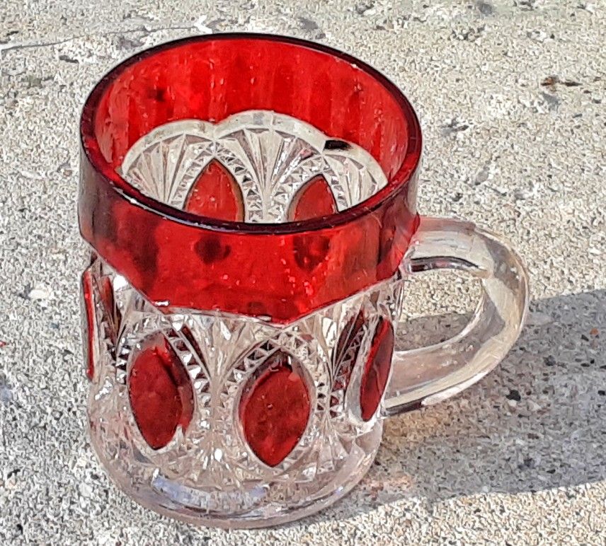 EAPG Victorian ruby stained pressed glass small child's mug.   Approx. 3" H x 2"D.  