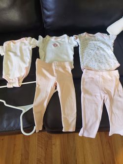 2 interchangeable outfits with an extra onesie 3-6 months