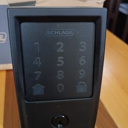 Schlage Encode Smart WiFi Deadbolt in matte black with Century trim.