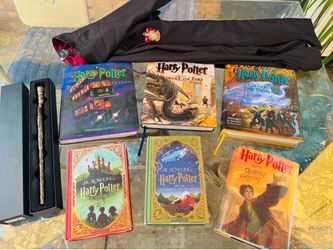 Harry Potter books, wand and cape!