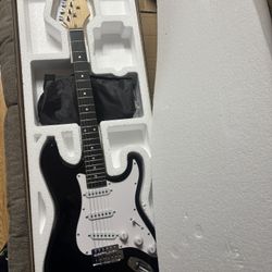 Gutair Black And White Electric 