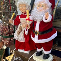 Mr Mrs Santa Moves Lights Works Her Apron Is Tattered